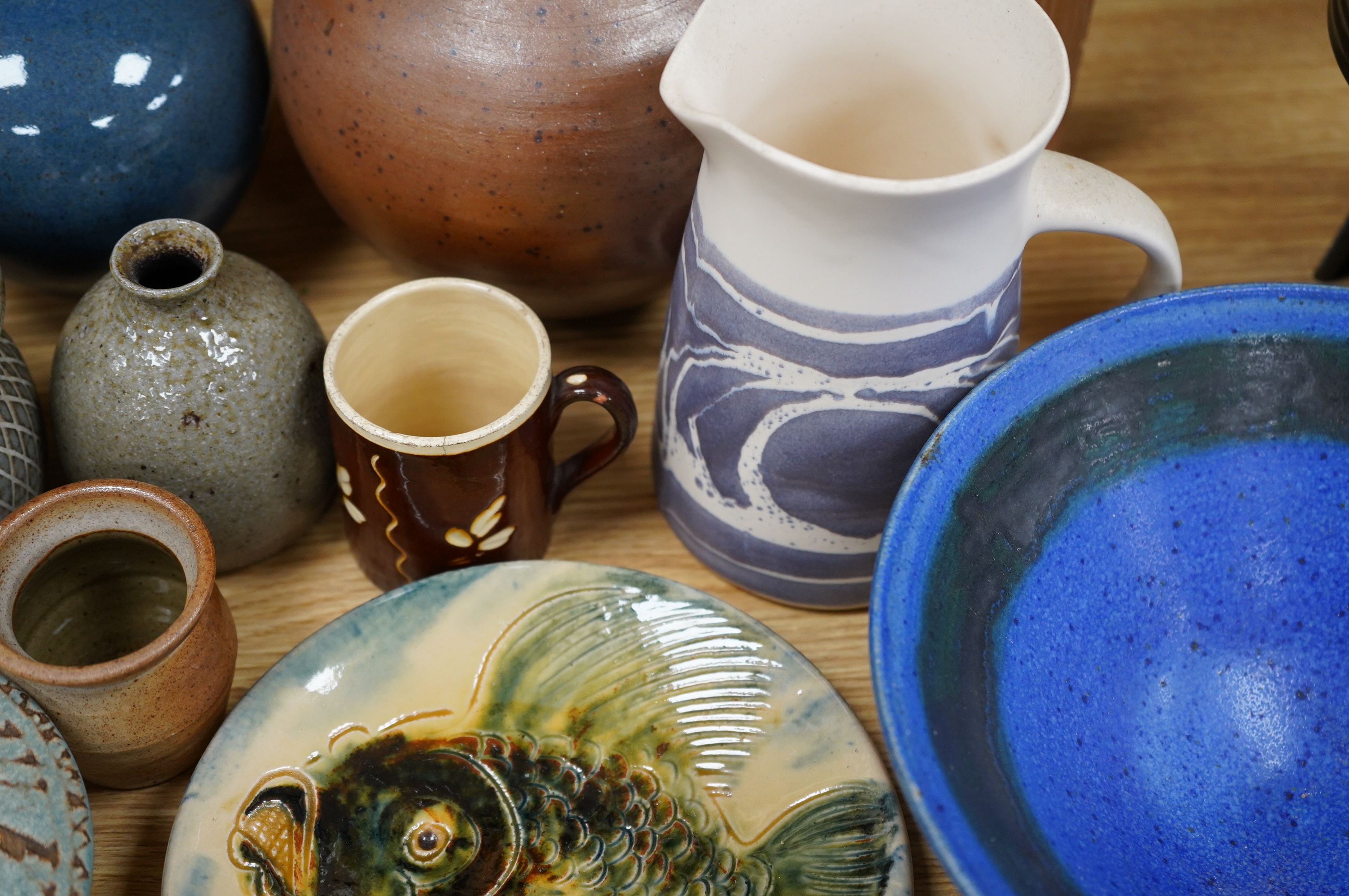 A collection of fourteen mixed studio pottery vases, bowls and jugs etc. Condition - good